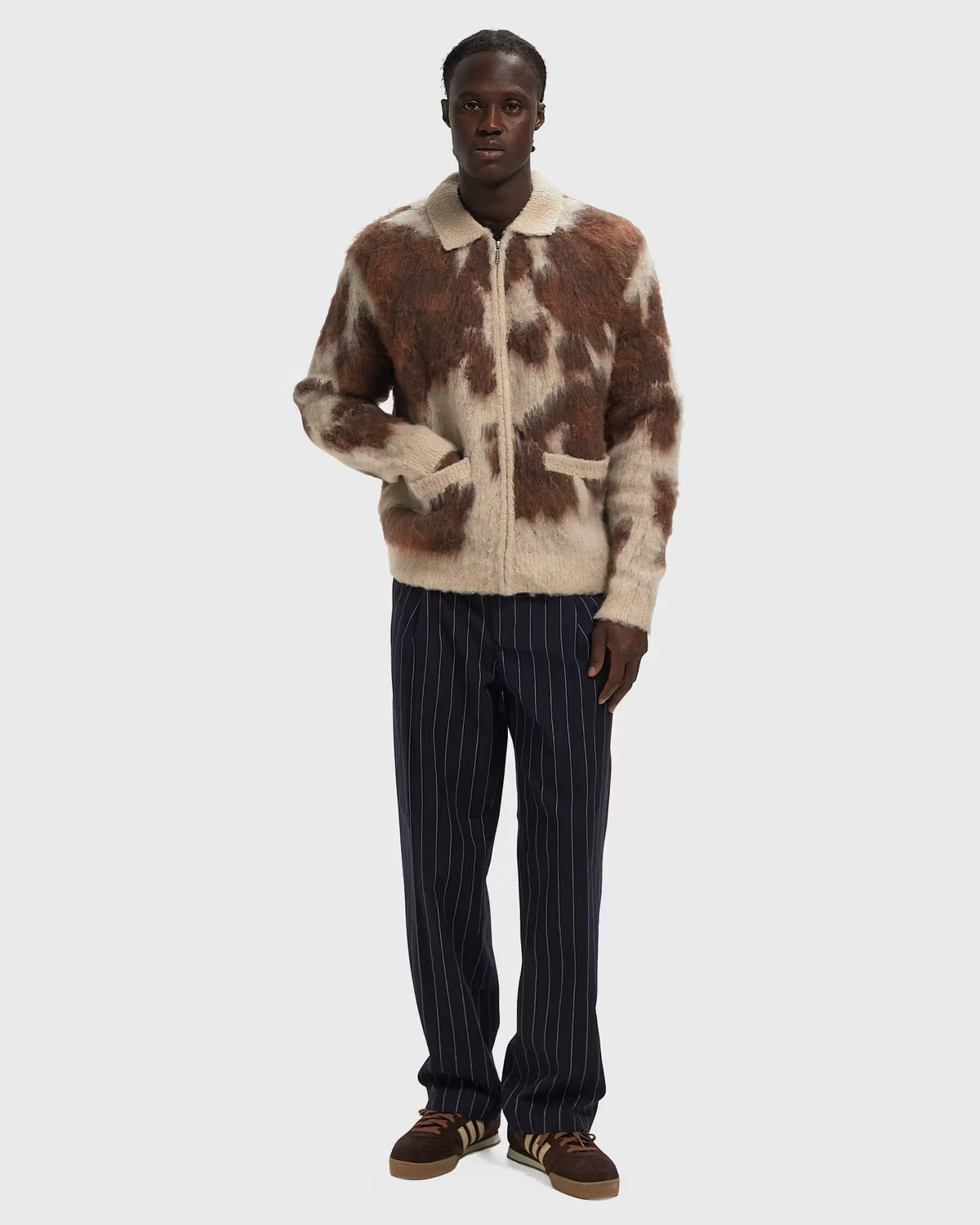 MAGLIONE CON ZIP COW PATTERN