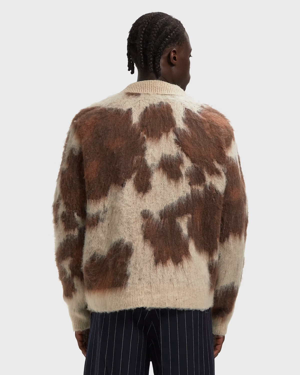MAGLIONE CON ZIP COW PATTERN