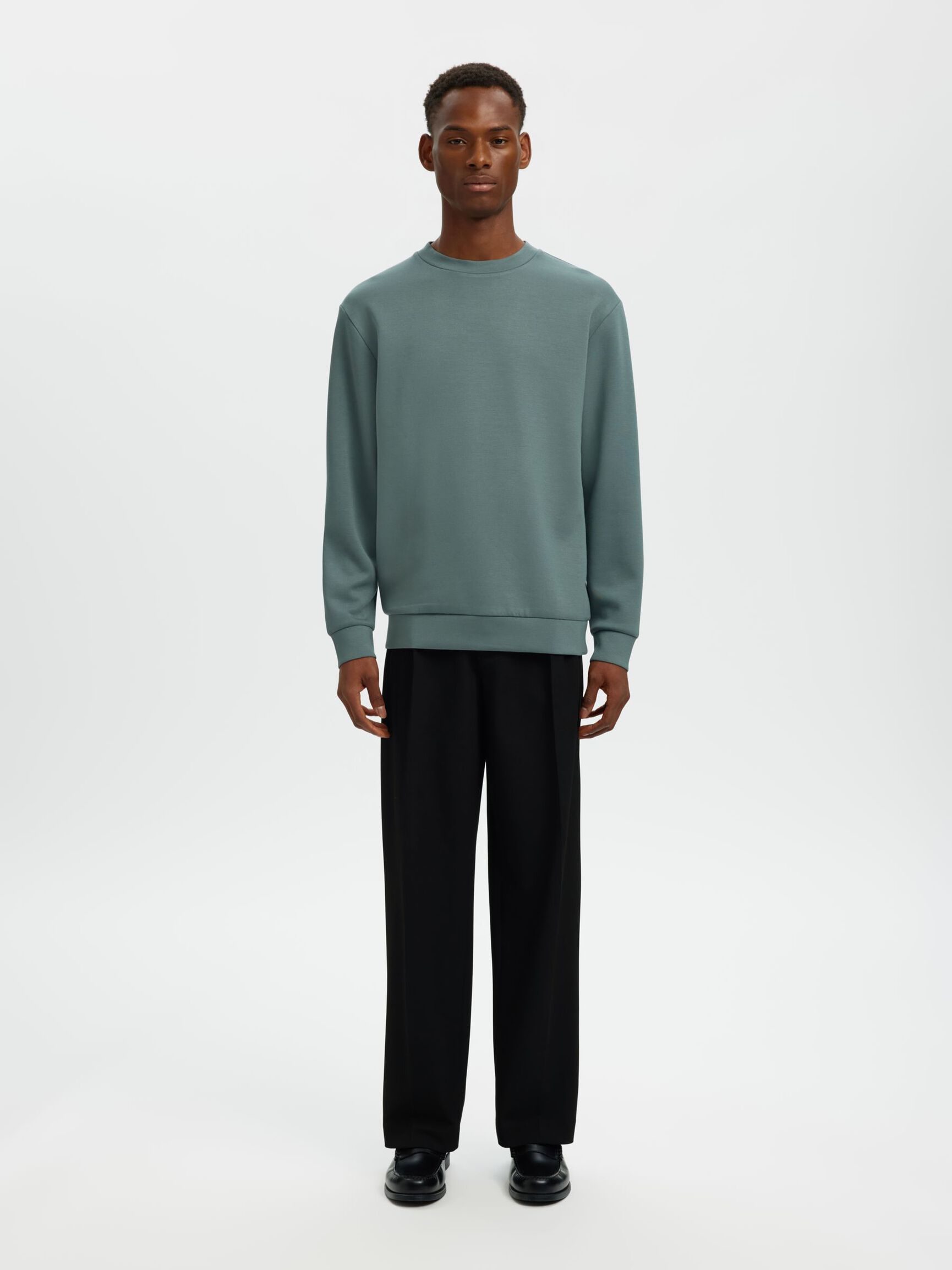 PANTALONI AMPI IN TESSUTO ELASTICIZZATO NERI