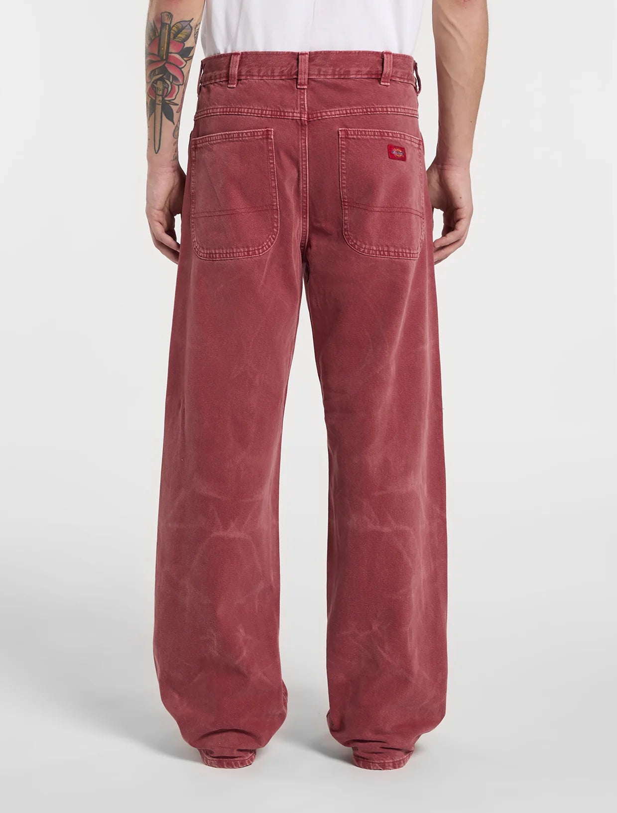 JEANS DRITTI BAGGY ROSSO GRANATO